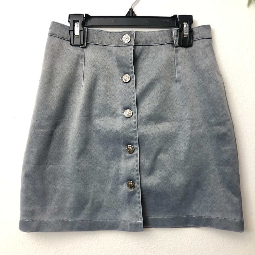 SAMI young size mini skirt buttoned in front.